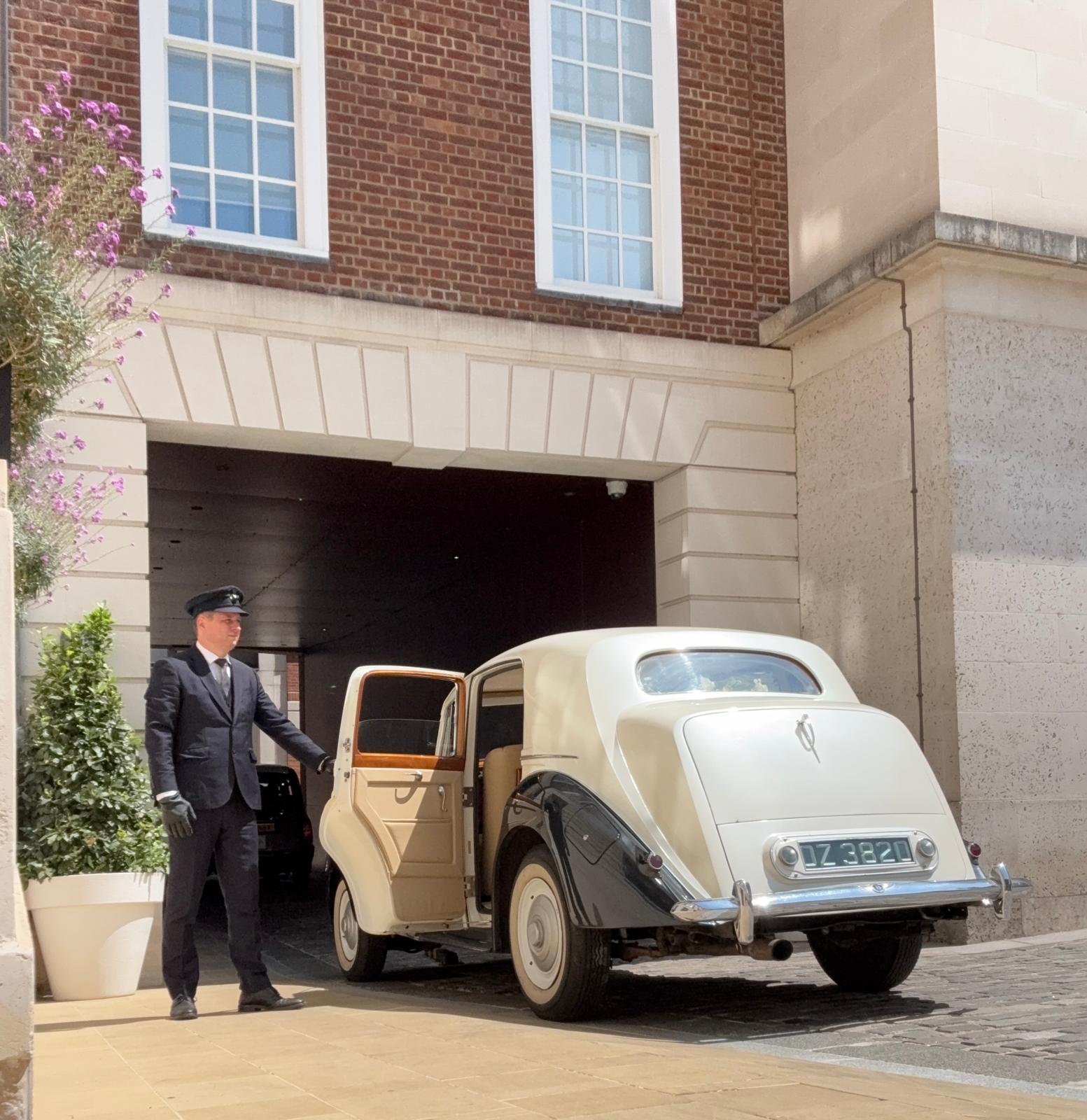 Vintage Bentley wedding car hire London bride arriving classic car