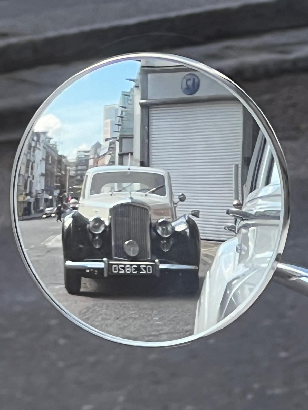Vintage Bentley wedding car hire London rear view classic Bentley Mark IV departure