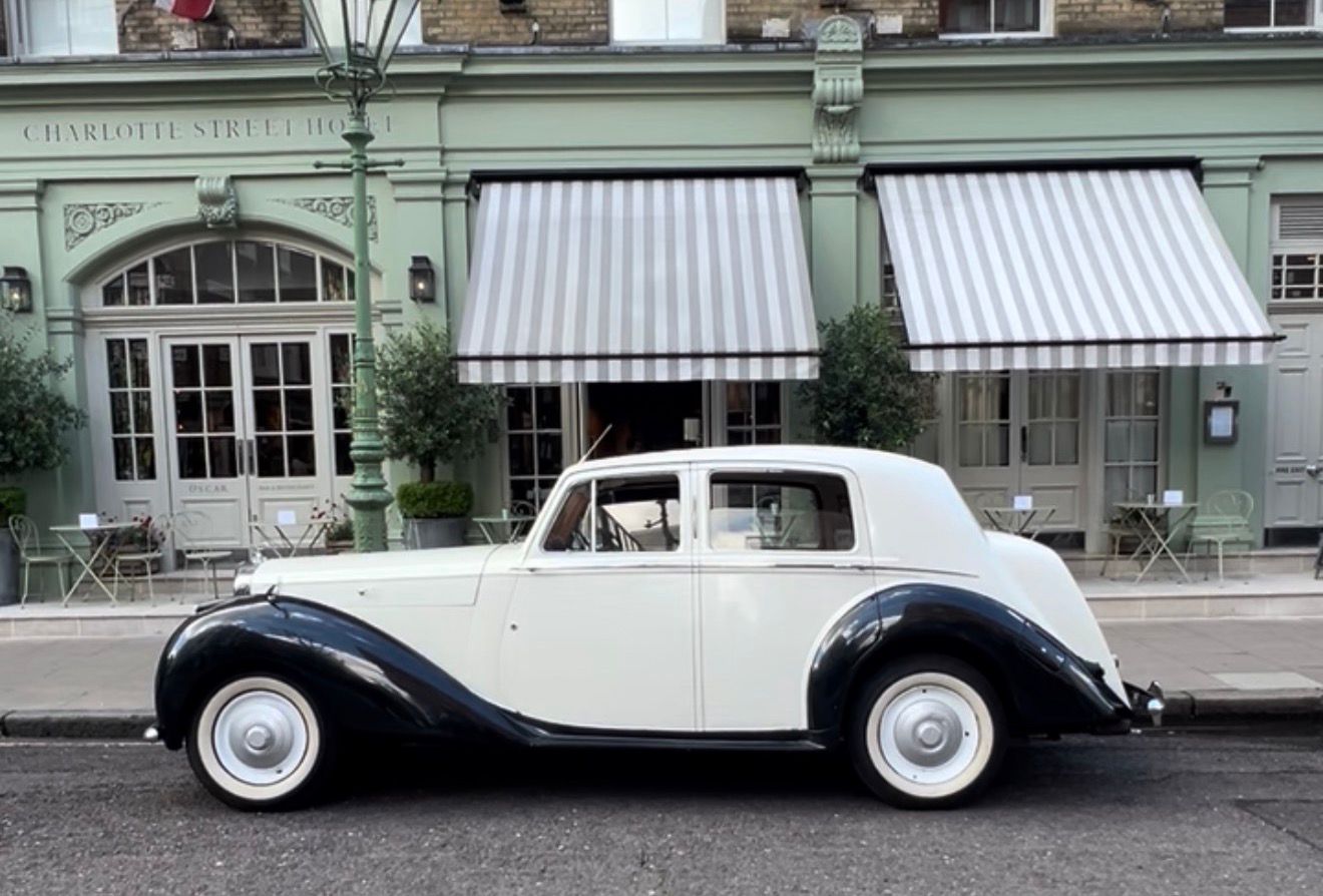 Vintage Bentley wedding car hire London close up Bentley badge classic detail