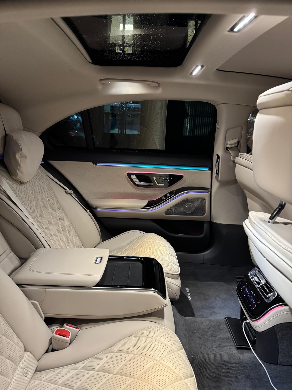 Luxury chauffeur service London professional uniformed driver