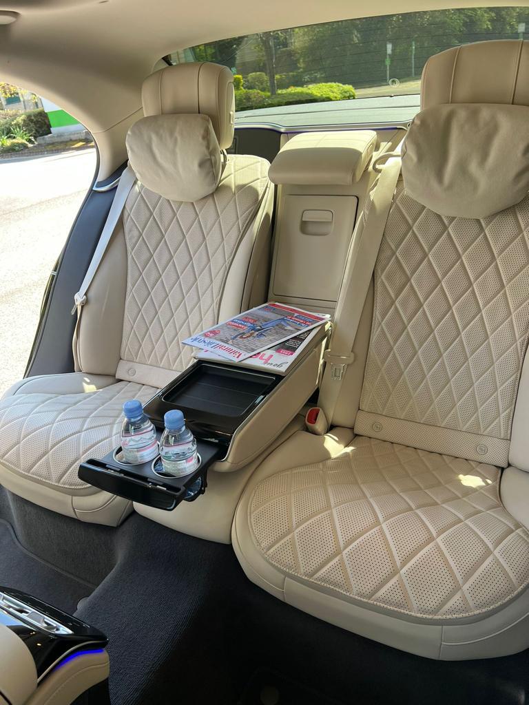 Luxury chauffeur service London rear entertainment champagne cabinet