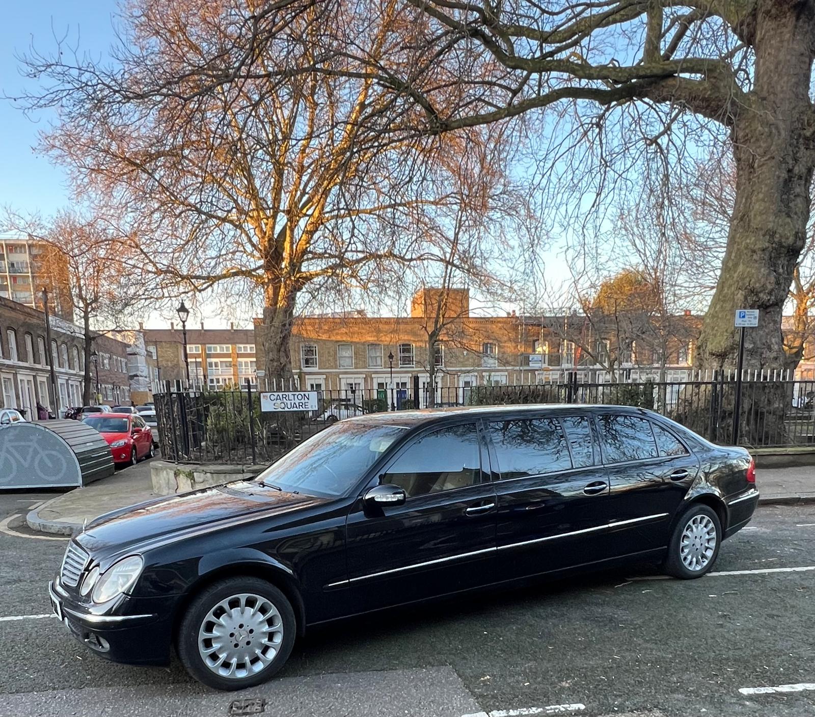 Mercedes E-Class chauffeur limousine exterior London airport transfer