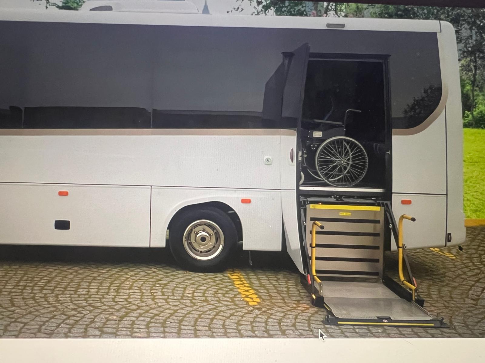 accessible coach hire London midi coach wheelchair ramp UK travel
