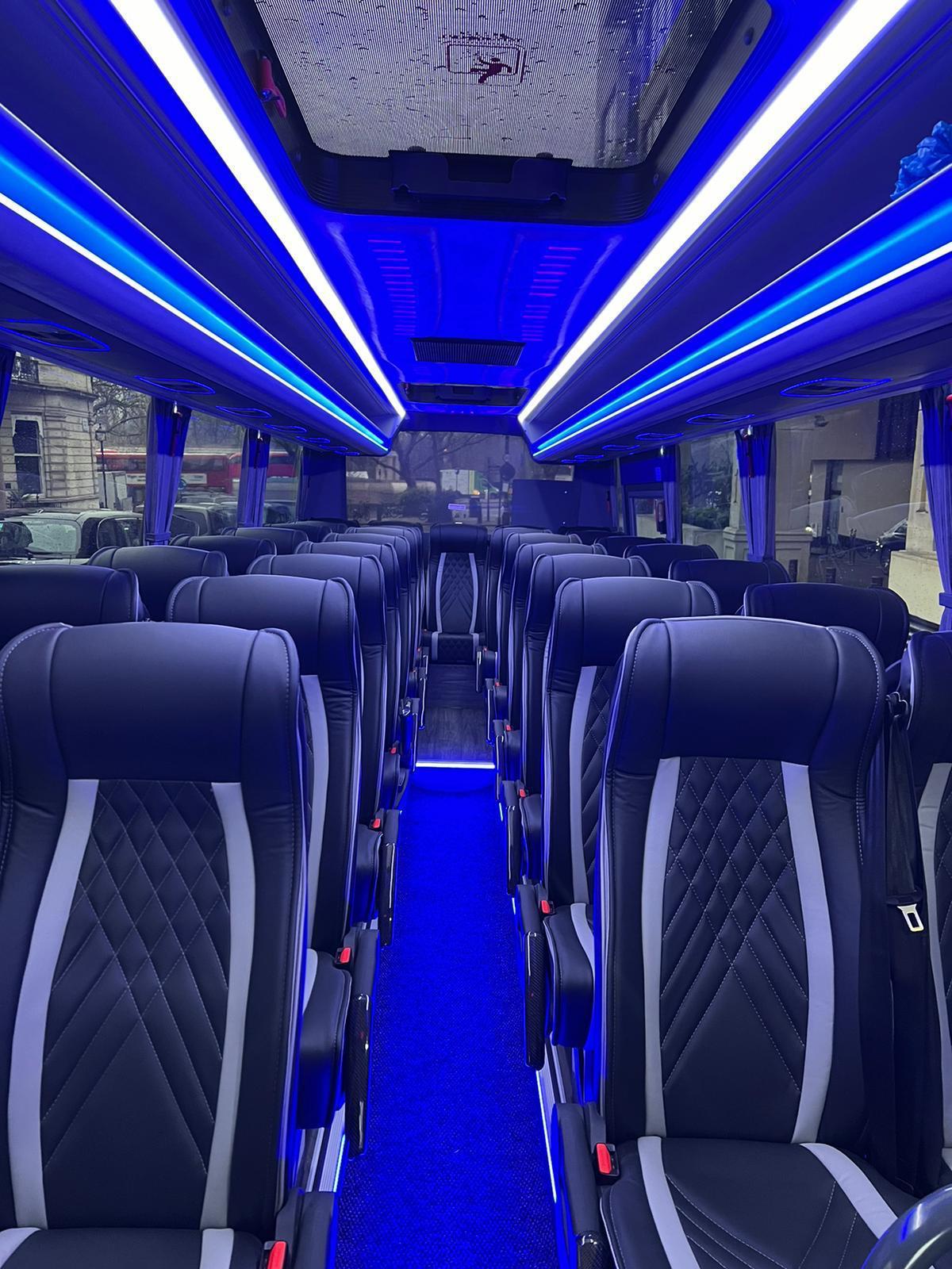 group transport London 32 seater coach hire with ramp