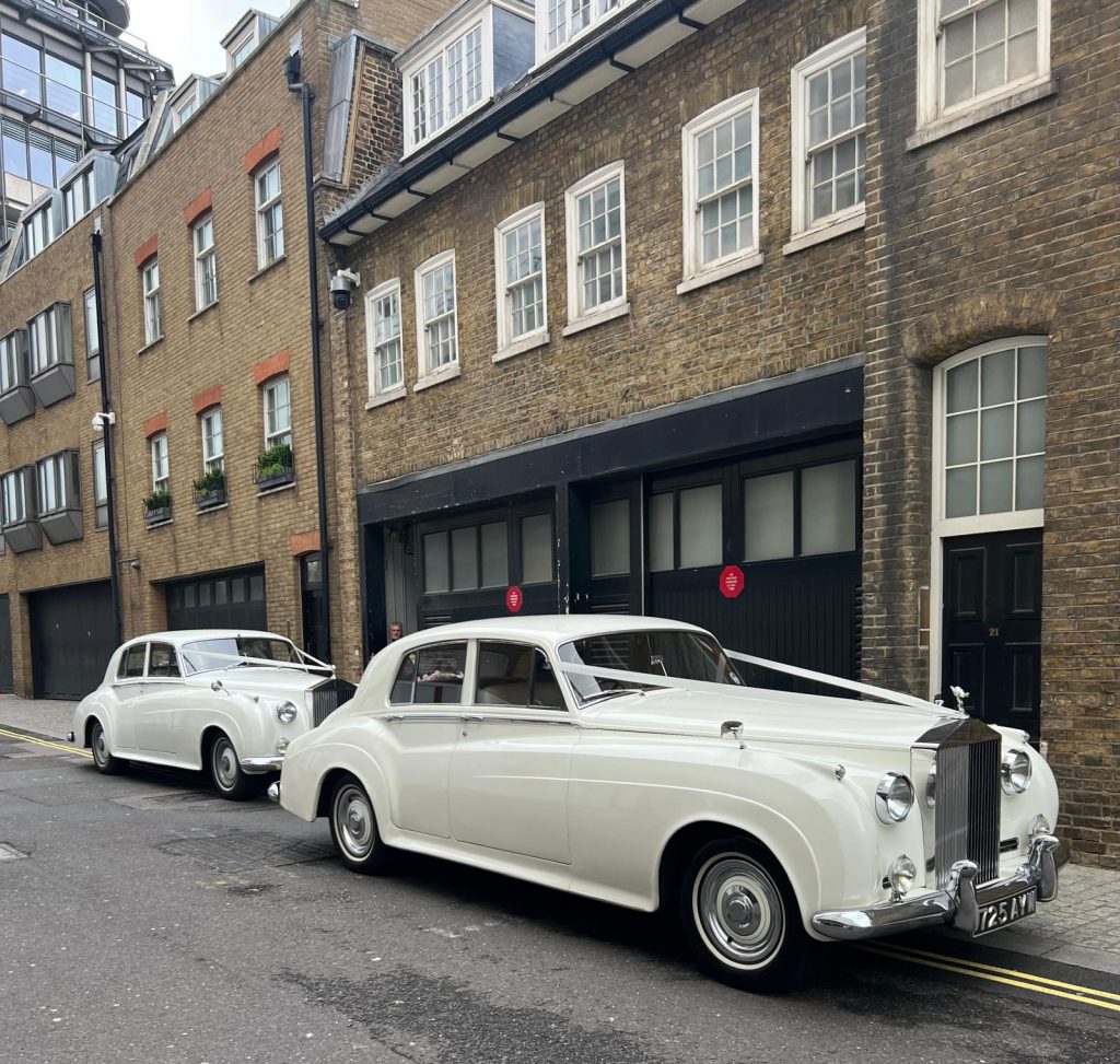 Modern Bentley Flying Spur wedding car hire London with decorations