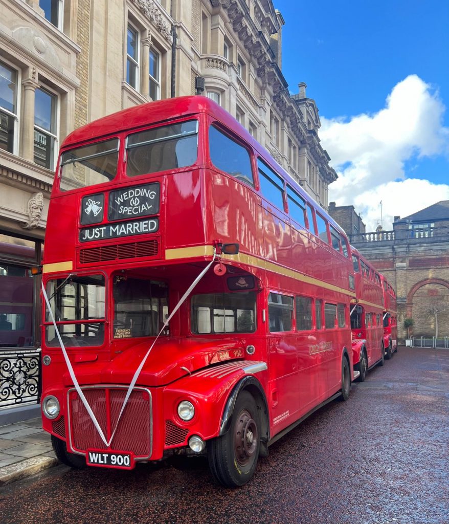 Classic red Routemaster bus in London with open rear platform