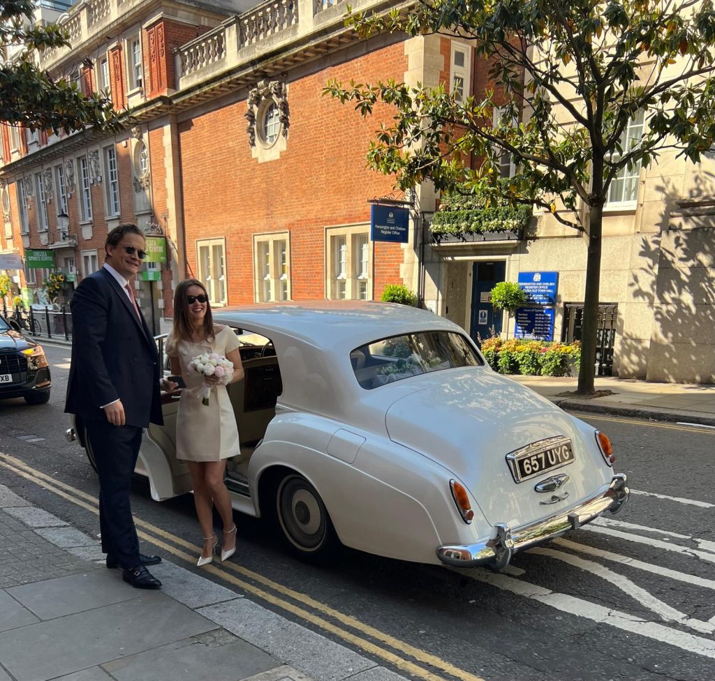 Modern luxury wedding car hire Chelsea London bride and groom arrival