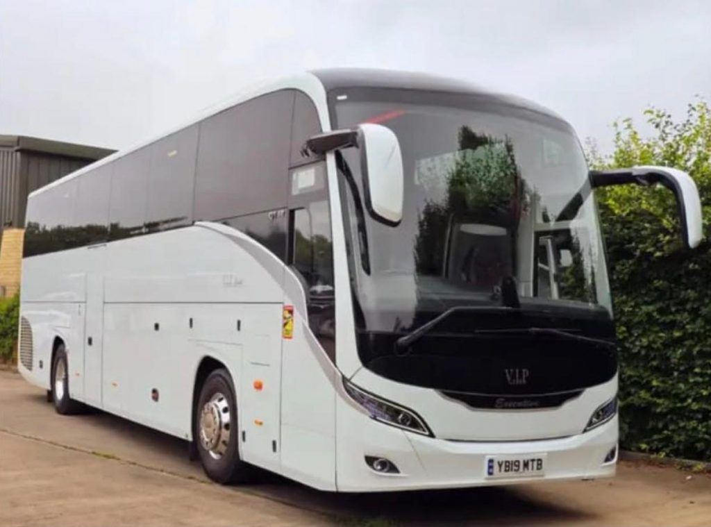 Passengers boarding private coach hire in London for corporate and event travel